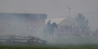 Phantom appears out of the smoke.